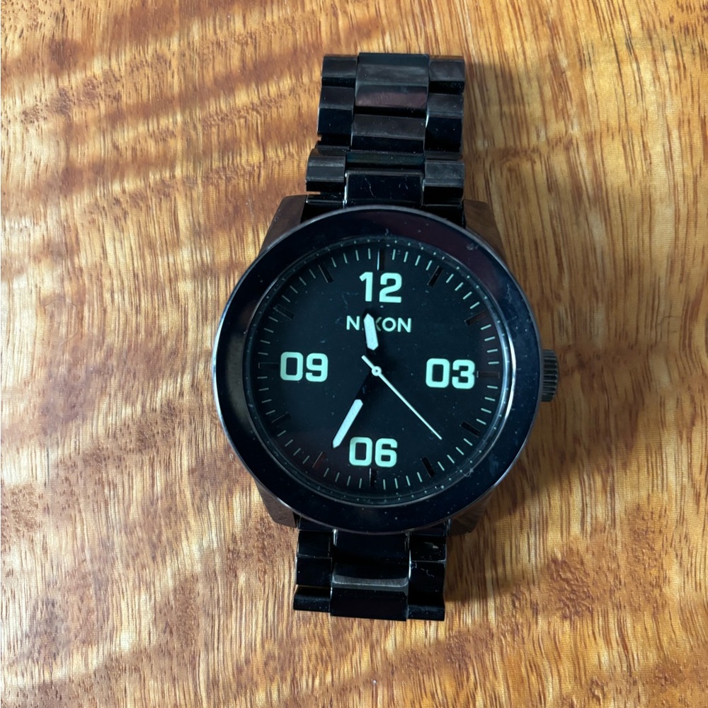 Nixon corporal gunmetal and green accents